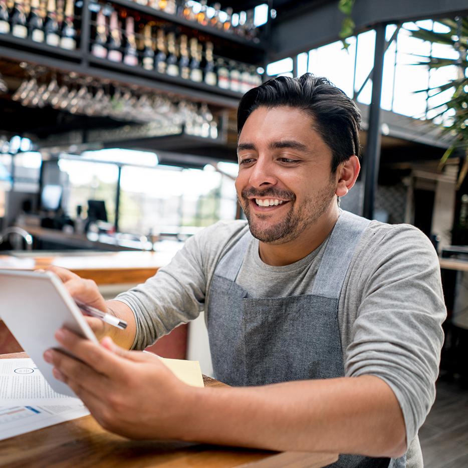 Manager doing the books at a restaurant